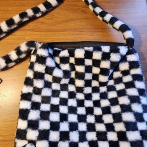 Checkerboard print fuzzy bag